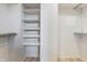 Walk-in closet with built-in shelving and ample storage space at 602 Prospect St, Indianapolis, IN 46203