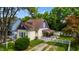 Charming home with a manicured front yard and white picket fence at 602 Prospect St, Indianapolis, IN 46203