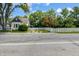 This home boasts a lovely exterior with a white picket fence and well-manicured front yard at 602 Prospect St, Indianapolis, IN 46203