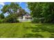 Charming single-Gathering home with a white picket fence and a well-manicured front yard at 602 Prospect St, Indianapolis, IN 46203
