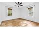 Bright bedroom boasts hardwood floors and an abundance of natural light at 6235 N Temple Ave, Indianapolis, IN 46220