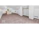 Bright bonus room offering neutral carpet, natural light, and flexible layout options at 6235 N Temple Ave, Indianapolis, IN 46220