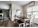 Bright dining room featuring stylish table setting, a window with natural light and modern decor at 628 Tess Blvd, Westfield, IN 46074