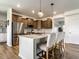 Modern kitchen featuring stainless steel appliances, a center island with seating, and pendant lighting at 628 Tess Blvd, Westfield, IN 46074
