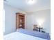 Bright bedroom featuring a bookcase, window and a comfortable bed at 6480 E Coal Bluff Ct, Camby, IN 46113
