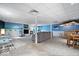 Finished basement features a cozy seating area with a fireplace and bar, perfect for entertaining at 6975 Milhouse Rd, Indianapolis, IN 46221