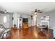 Bright living room featuring hardwood floors, neutral walls, and stylish furnishings at 7 Pondview Ct, Brownsburg, IN 46112