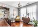 Comfortable living room featuring hardwood floors, natural light, and an accent chair at 7 Pondview Ct, Brownsburg, IN 46112