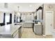 Modern kitchen featuring an island with marble countertops, stainless steel appliances, and white cabinets at 7252 Lockford N, Avon, IN 46123