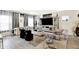 Spacious living room with modern decor, plush seating, and ample natural light at 7252 Lockford N, Avon, IN 46123