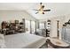 Stylish bedroom featuring vaulted ceilings, shelves with handbags, and modern furniture at 7252 Lockford N, Avon, IN 46123