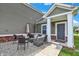 Cozy patio with stone ground covering features comfortable seating and backyard access at 7252 Lockford N, Avon, IN 46123