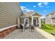 Relaxing outdoor patio area with gravel, seating, and shade, perfect for entertaining at 7252 Lockford N, Avon, IN 46123