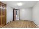 Neutral bedroom with modern flooring, closet, and door, offering a blank slate at 750 Hillcrest Dr, Greenwood, IN 46142