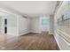 Spacious living area with wood floors and open access to other rooms at 750 Hillcrest Dr, Greenwood, IN 46142