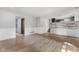 Open living space boasts modern flooring, wainscoting, and an open floor plan at 750 Hillcrest Dr, Greenwood, IN 46142