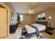 Spacious bedroom featuring a luxurious bed with plush pillows and modern decor at 8069 Middle Bay Ln, Indianapolis, IN 46236