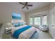 Relaxing bedroom with a bay window, white furniture, and cool-toned accents at 8069 Middle Bay Ln, Indianapolis, IN 46236