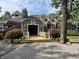 Clubhouse exterior showcases a covered entrance and an inviting facade at 8069 Middle Bay Ln, Indianapolis, IN 46236