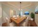 Dining room with a wood table, six chairs, and simple decor at 8069 Middle Bay Ln, Indianapolis, IN 46236