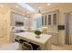 Modern kitchen with stainless steel appliances, grey cabinets, and a large island at 8069 Middle Bay Ln, Indianapolis, IN 46236