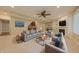 Cozy living area with comfortable seating, fireplace, and a modern entertainment setup at 8069 Middle Bay Ln, Indianapolis, IN 46236