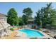Aerial view of a beautiful pool area with a gazebo and lounge chairs at 8069 Middle Bay Ln, Indianapolis, IN 46236