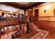 Spacious foyer with detailed woodwork, decorative ceiling, and grand staircase at 825 E Washington St, Muncie, IN 47305