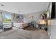 Cozy bedroom decorated with personal touches and plenty of natural light at 8435 Hilltop Ln, Martinsville, IN 46151