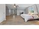 Bright main bedroom with a walkout door and ample space at 8435 Hilltop Ln, Martinsville, IN 46151