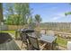 Outdoor deck with table and chairs, perfect for outdoor relaxation at 8526 Country Meadows Dr, Indianapolis, IN 46234