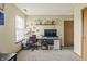 Inviting bedroom with a dedicated workspace, natural light, and neutral decor at 8526 Country Meadows Dr, Indianapolis, IN 46234
