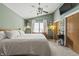 Primary bedroom features a spacious layout, large window, and comfortable bed at 8526 Country Meadows Dr, Indianapolis, IN 46234