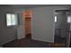 Bedroom with a closet, neutral paint, and a window letting in natural light at 9016 Neptune Dr, Indianapolis, IN 46229