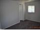 Bedroom featuring fresh paint, carpet, and a window with blinds at 9016 Neptune Dr, Indianapolis, IN 46229