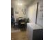 This dining area features an eat-in area with a dark wood table and room for seating for four at 9016 Neptune Dr, Indianapolis, IN 46229