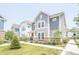 Attractive two-story home in a community setting, featuring a well-maintained lawn and walkway at 9248 Hawley Dr, Indianapolis, IN 46216