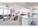 Open-concept living space showcases a kitchen island, dining area, and a cozy living room at 9248 Hawley Dr, Indianapolis, IN 46216