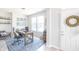 Cozy home office with rustic desk, stylish chair, and unique decor for an inviting workspace at 9248 Hawley Dr, Indianapolis, IN 46216