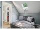 Cozy bonus room featuring a unique daybed, skylight, and convenient closet access at 9256 Colgate St, Indianapolis, IN 46268