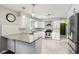 Modern kitchen features sleek white cabinets, stainless steel appliances, and ample counter space at 9256 Colgate St, Indianapolis, IN 46268