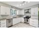 Well-designed kitchen with white cabinets, stainless steel appliances, and modern fixtures at 9256 Colgate St, Indianapolis, IN 46268