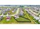 Aerial view of a well-planned community with fenced backyards and green spaces, creating a harmonious living environment at 937 Maple Stone Dr, Greenwood, IN 46143