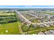 Subdivision aerial view featuring a spacious, fenced backyard with nearby wooded area, perfect for outdoor enjoyment at 937 Maple Stone Dr, Greenwood, IN 46143