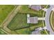 Aerial view showcasing a backyard with a patio and fenced yard, offering an outdoor living space at 937 Maple Stone Dr, Greenwood, IN 46143