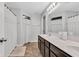 Well-lit bathroom with a dual sink vanity, and shower and curtain, providing a luxurious and functional space at 937 Maple Stone Dr, Greenwood, IN 46143