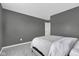 Inviting bedroom with cozy carpet and minimalist design, ideal for relaxation and restful nights at 937 Maple Stone Dr, Greenwood, IN 46143