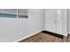 A light and airy entryway with hardwood floors, a white door, and simple decor at 937 Maple Stone Dr, Greenwood, IN 46143