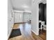 Welcoming entryway featuring wood flooring, a stylish front door, and a convenient powder room at 937 Maple Stone Dr, Greenwood, IN 46143