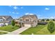Charming two-story home with a well-manicured lawn and welcoming curb appeal at 937 Maple Stone Dr, Greenwood, IN 46143